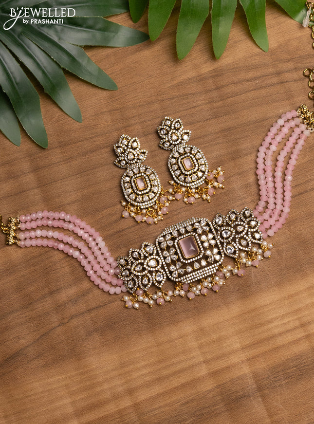 Beaded baby pink choker with baby pink & kundan stones and beads hanging in victorian finish