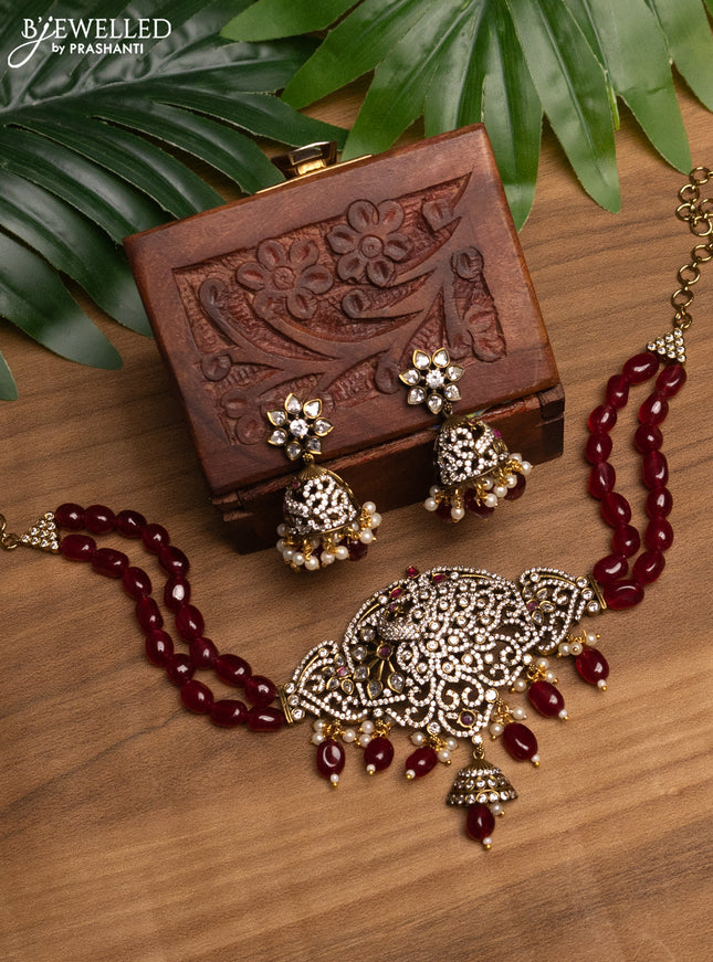 Beaded maroon choker with ruby & cz stones and beads hanging in victorian finish