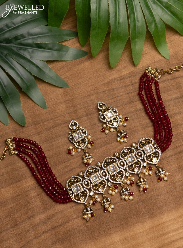 Beaded maroon choker with kundan & cz stones and beads hanging in victorian finish
