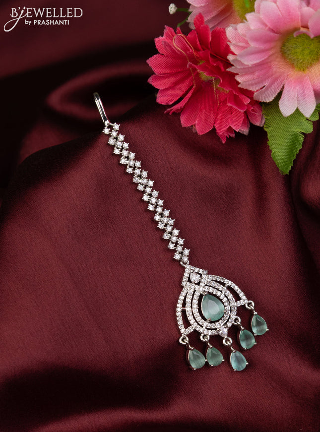 Zircon maang tikka with mint green & cz stones and hangings