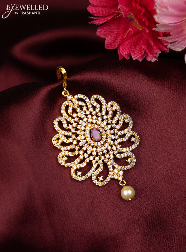 Zircon maang tikka with ruby & cz stones and hangings in gold finish
