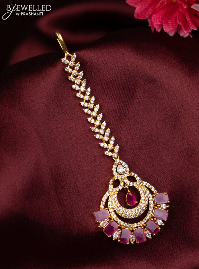Zircon maang tikka with ruby & cz stones in gold finish