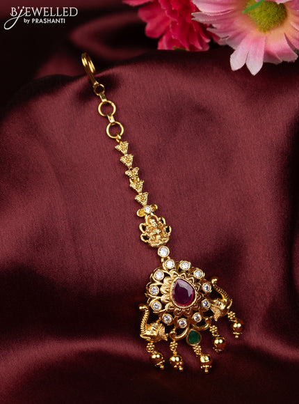 Antique maang tikka lakshmi design with pink kemp & cz stones and golden beads hanging