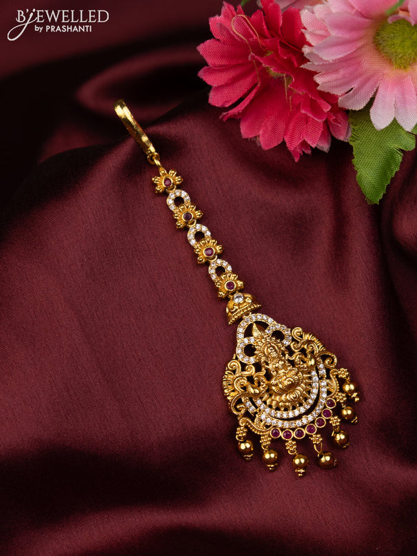 Antique maang tikka lakshmi design with pink kemp & cz stones and golden beads hanging