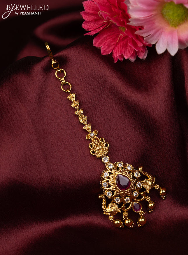 Antique maang tikka with pink kemp & cz stones and golden beads hanging