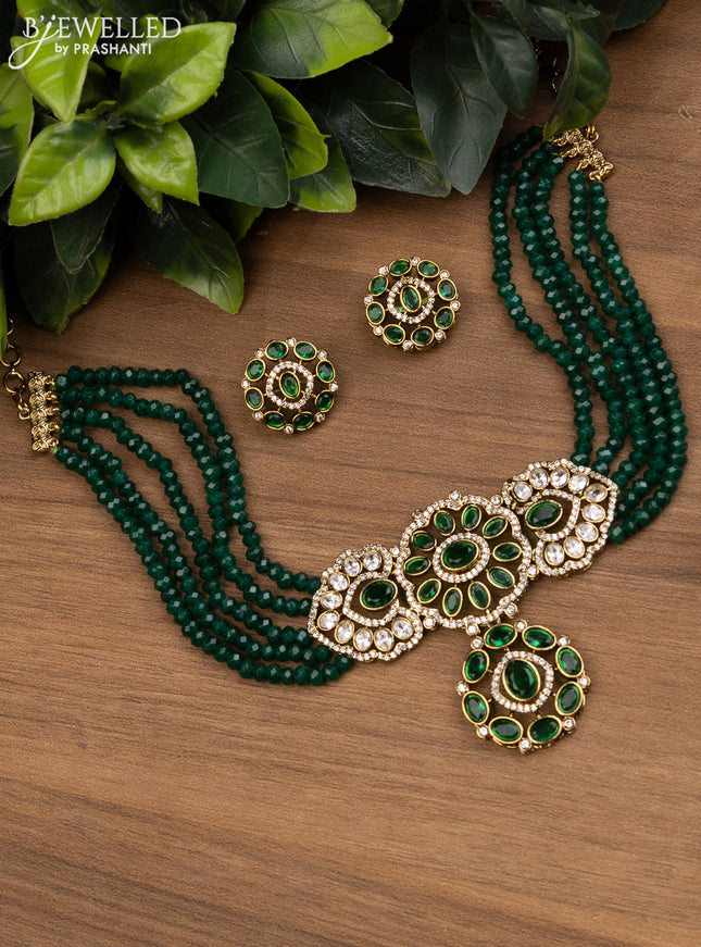 Beaded green choker with emerald and cz stones pendant