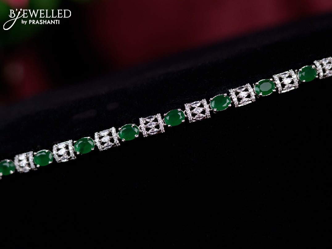 Zircon hip chain with emerald and cz stones