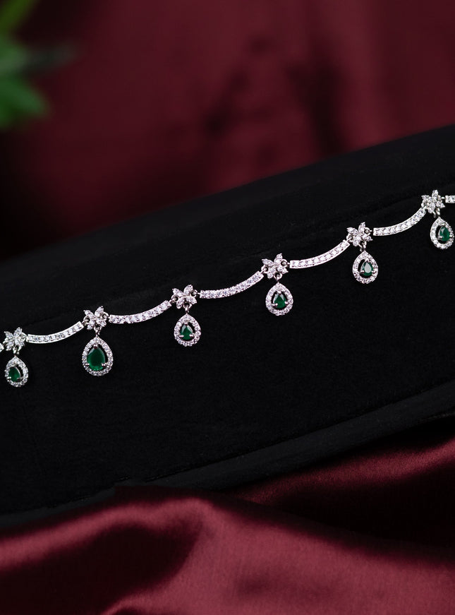 Zircon hip chain with emerald and cz stones