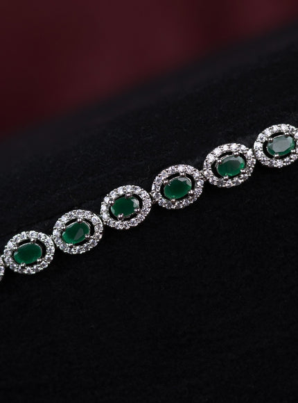 Zircon hip chain with emerald and cz stones