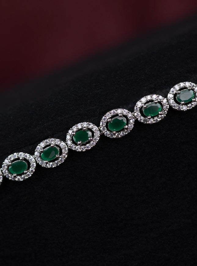 Zircon hip chain with emerald and cz stones