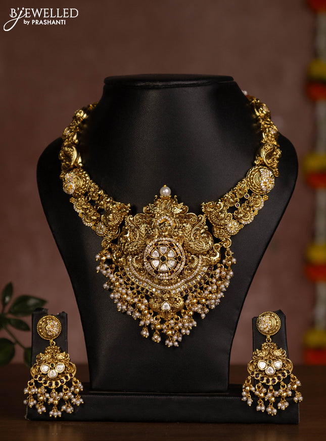 Antique necklace peacock design with kemp & kundan stones and pearl hangings