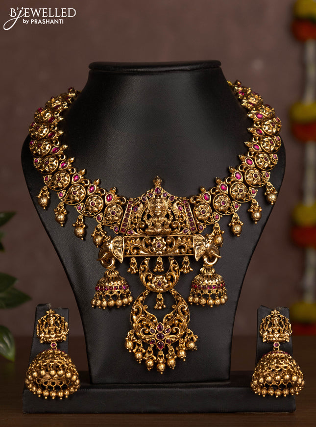 Antique necklace lakshmi design with pink jadau stones and golden beads hanging