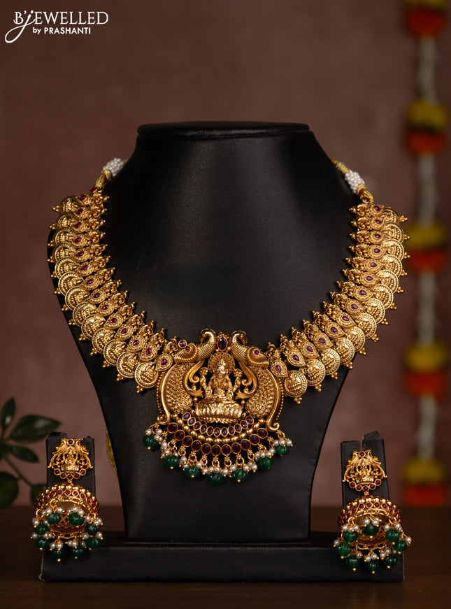Antique necklace lakshmi kasu design with pink jadau stones and green beads hanging