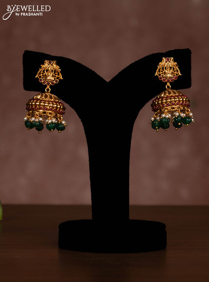 Antique necklace lakshmi kasu design with pink jadau stones and green beads hanging