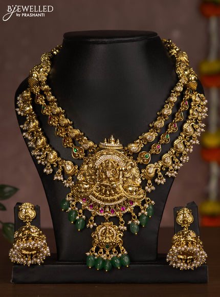 Antique triple layer necklace lakshmi design with jadau stones and green beads hanging