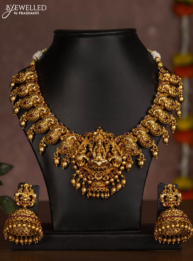Antique necklace lakshmi design with pink kemp stones and golden beads hanging