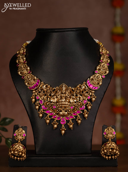 Antique necklace lakshmi design with pink jadau stones and golden beads hanging