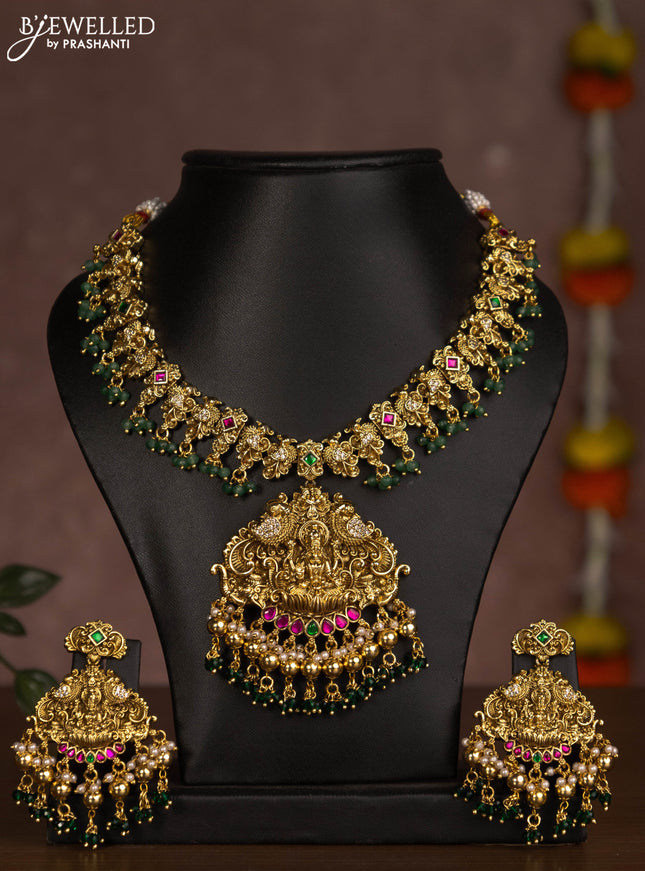 Antique necklace lakshmi design with jadau stones and green beads hanging
