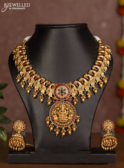 Antique necklace lakshmi design with jadau stones and golden beads hanging