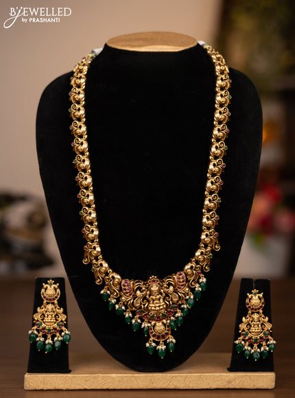 Antique haaram lakshmi design with jadau stones and green beads hanging