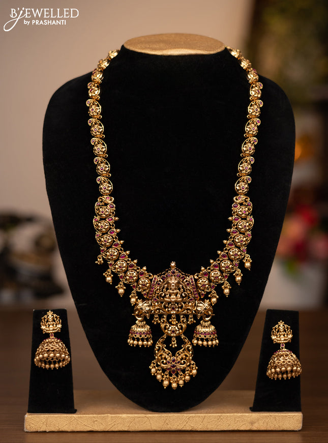 Antique haaram lakshmi design with pink jadau stones and golden beads hanging