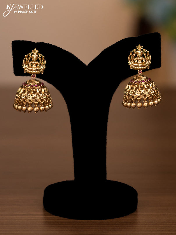 Antique haaram lakshmi design with pink jadau stones and golden beads hanging