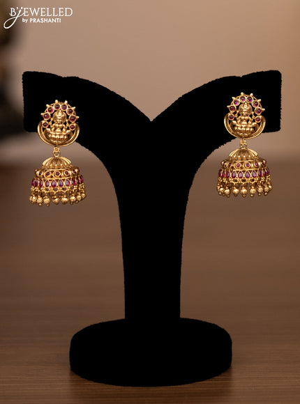 Antique haaram lakshmi design with pink kemp stones and golden beads hanging