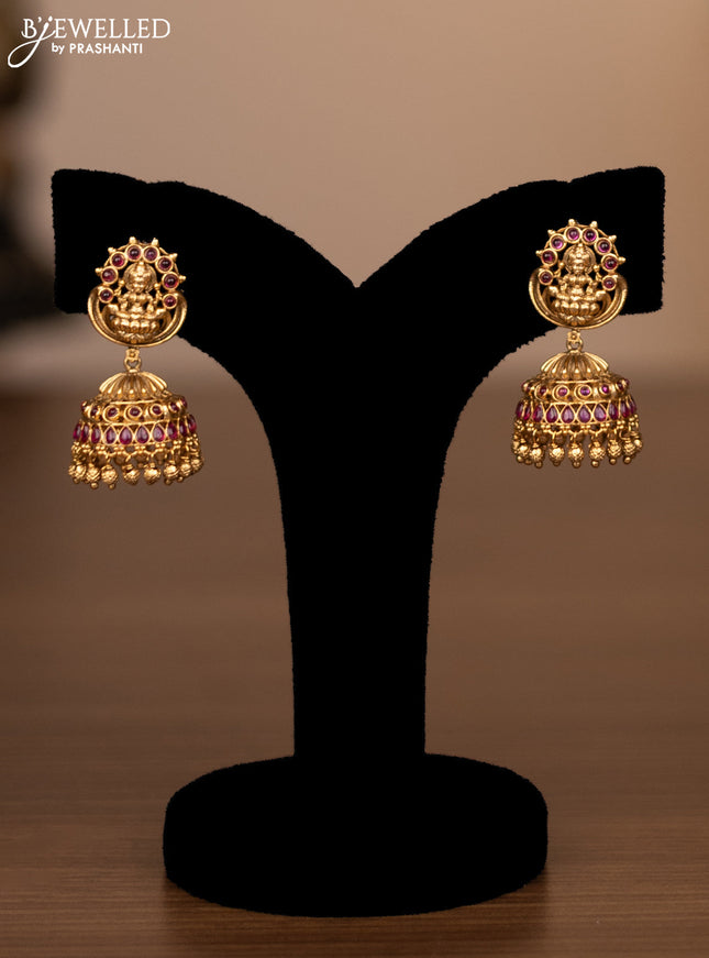 Antique haaram lakshmi design with pink kemp stones and golden beads hanging