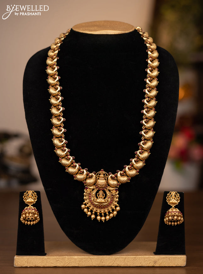 Antique haaram peacock & lakshmi design with pink kemp stones and golden beads hanging