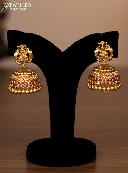 Antique haaram lakshmi design with pink kemp stones and golden beads hanging