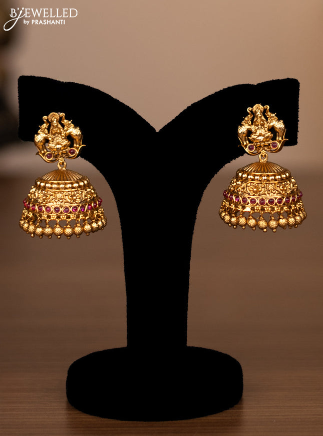 Antique haaram lakshmi design with pink kemp stones and golden beads hanging