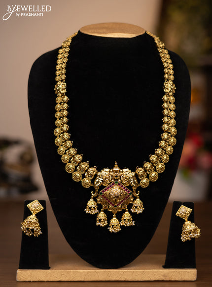 Antique haaram elephant design with jadau stones and pearl hangings