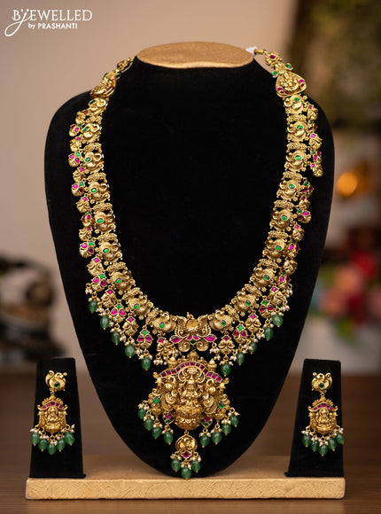 Antique haaram lakshmi design with jadau stones and green beads hanging