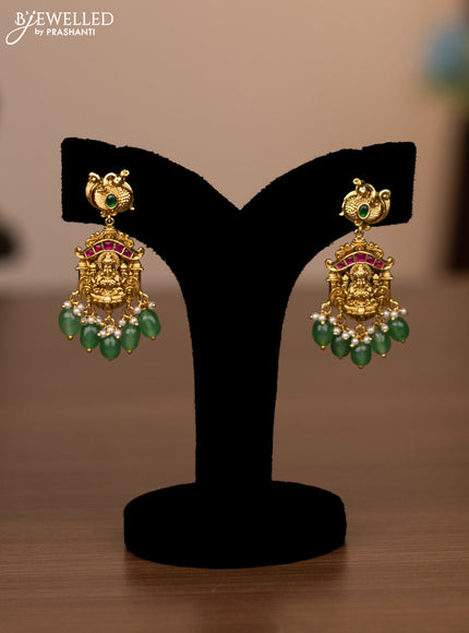 Antique haaram lakshmi design with jadau stones and green beads hanging