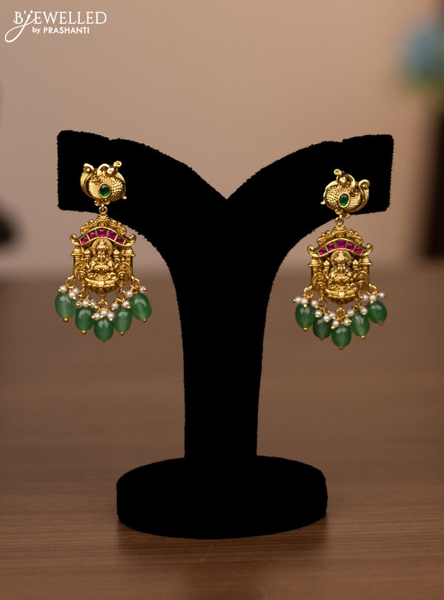 Antique haaram lakshmi design with jadau stones and green beads hanging