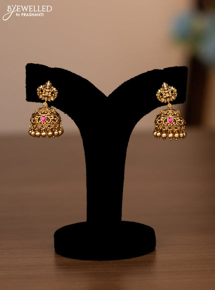 Antique haaram lakshmi design with pink jadau stones and golden beads hanging