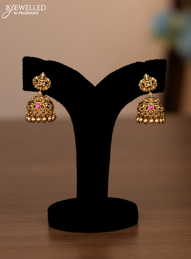 Antique haaram lakshmi design with pink jadau stones and golden beads hanging