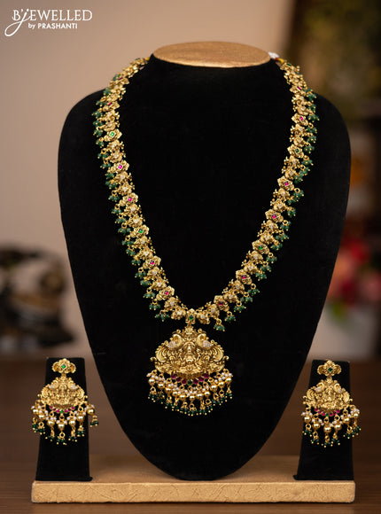 Antique haaram lakshmi design with jadau stones and green beads hanging