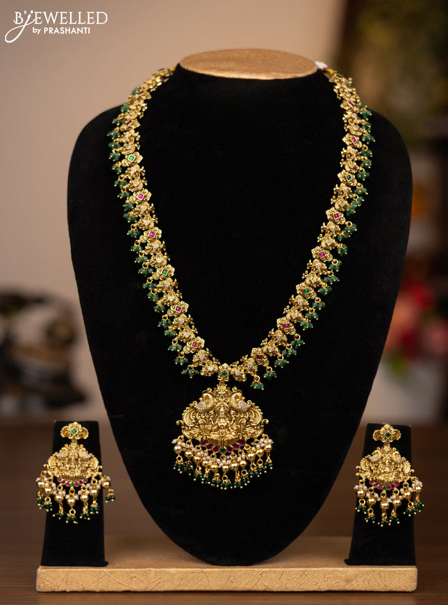 Antique haaram lakshmi design with jadau stones and green beads hanging