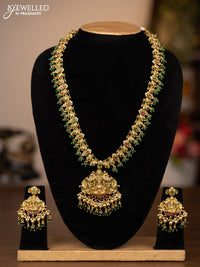 Antique haaram lakshmi design with jadau stones and green beads hanging