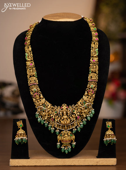Antique haaram lakshmi design with jadau stones and green beads hanging
