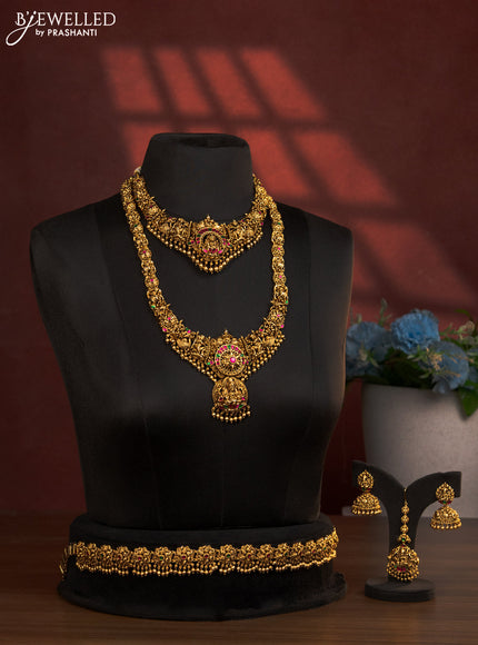 Antique bridal set lakshmi design with jadau stones and golden beads hanging