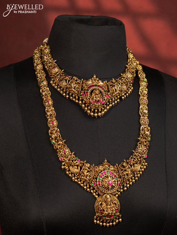 Antique bridal set lakshmi design with jadau stones and golden beads hanging