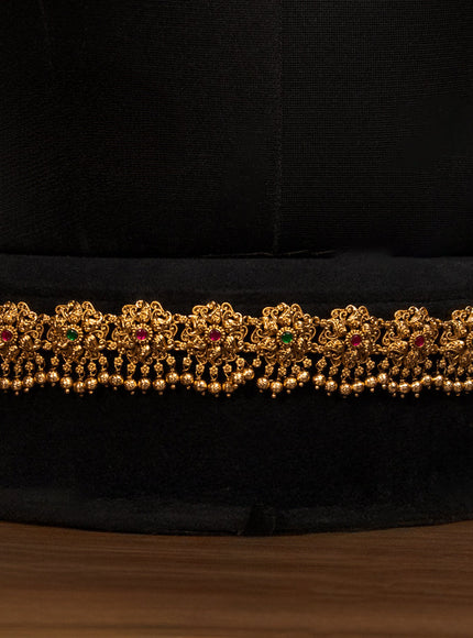 Antique bridal set lakshmi design with jadau stones and golden beads hanging