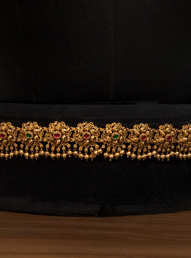 Antique bridal set lakshmi design with jadau stones and golden beads hanging