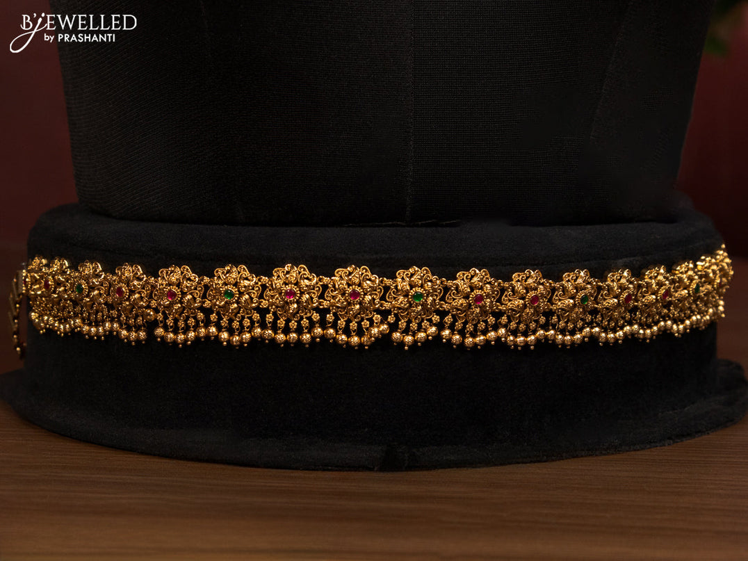 Antique bridal set lakshmi design with jadau stones and golden beads hanging