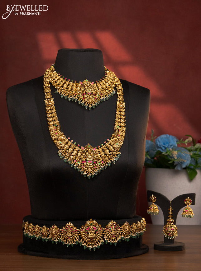 Antique bridal set lakshmi design with jadau stones and green beads hanging