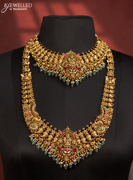 Antique bridal set lakshmi design with jadau stones and green beads hanging