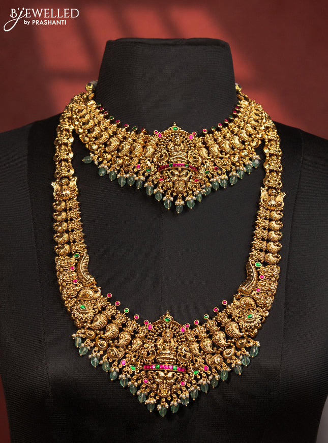 Antique bridal set lakshmi design with jadau stones and green beads hanging