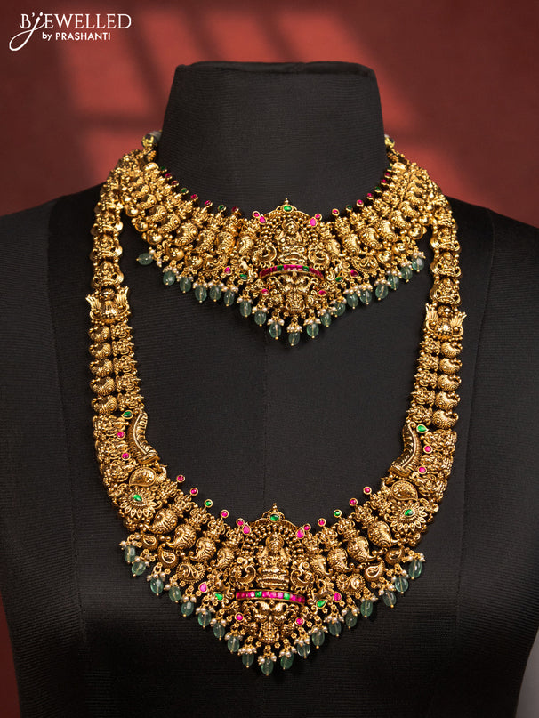 Antique bridal set lakshmi design with jadau stones and green beads hanging